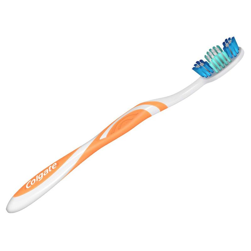 escova de dente colgate tripla ação