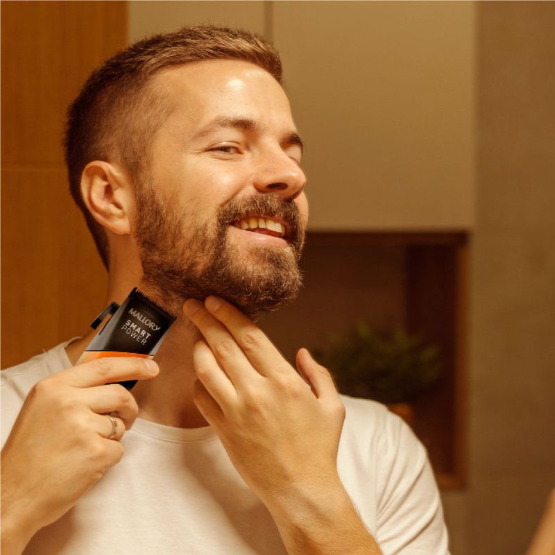 máquina de cortar cabelo mallory smart power preto e laranja